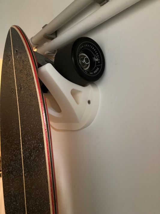 Skateboard wall hanger