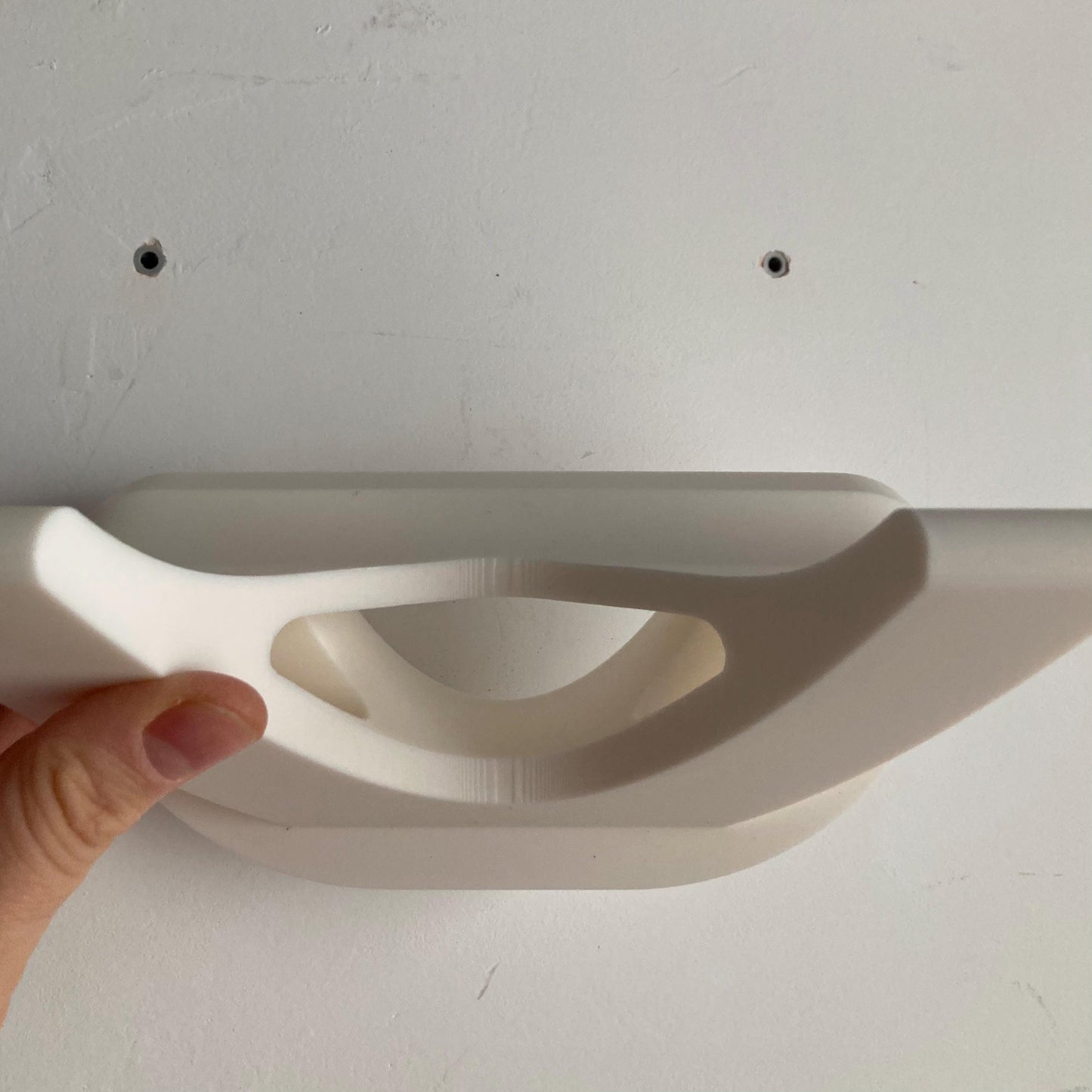 Skateboard wall hanger