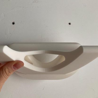 Skateboard wall hanger