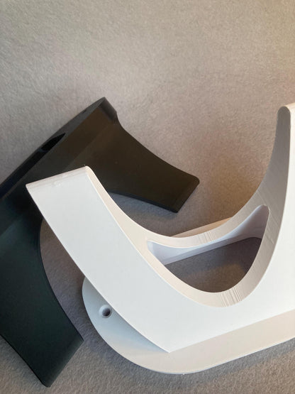 Skateboard wall hanger